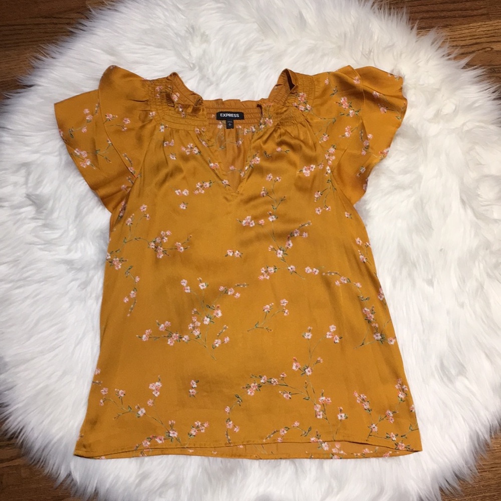 Express sleeveless top.
